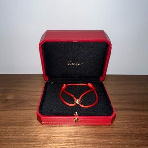 Cartier Red Cord Bracelet with Gold Accents